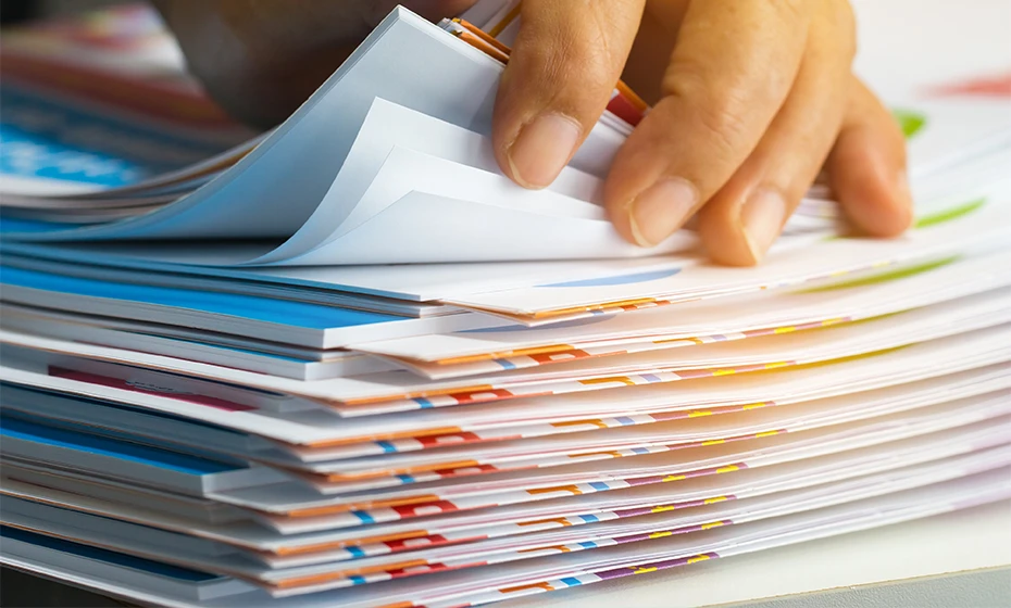 hand stack of documents
