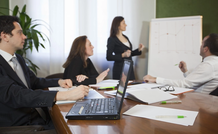 meeting colleagues office whiteboard